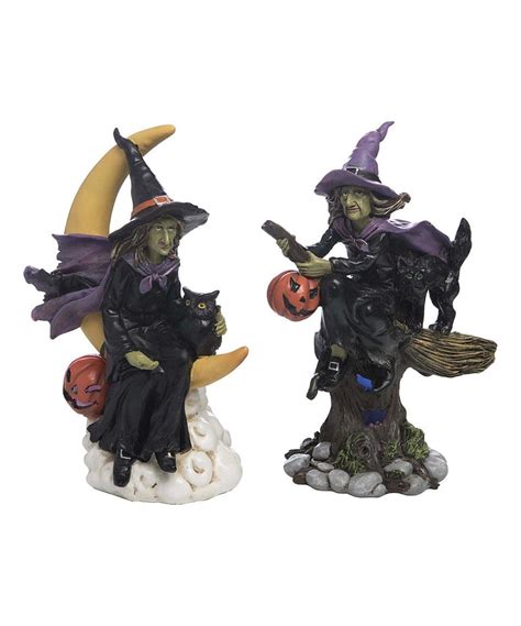 Witch figurine with glowing lights and captivating sounds